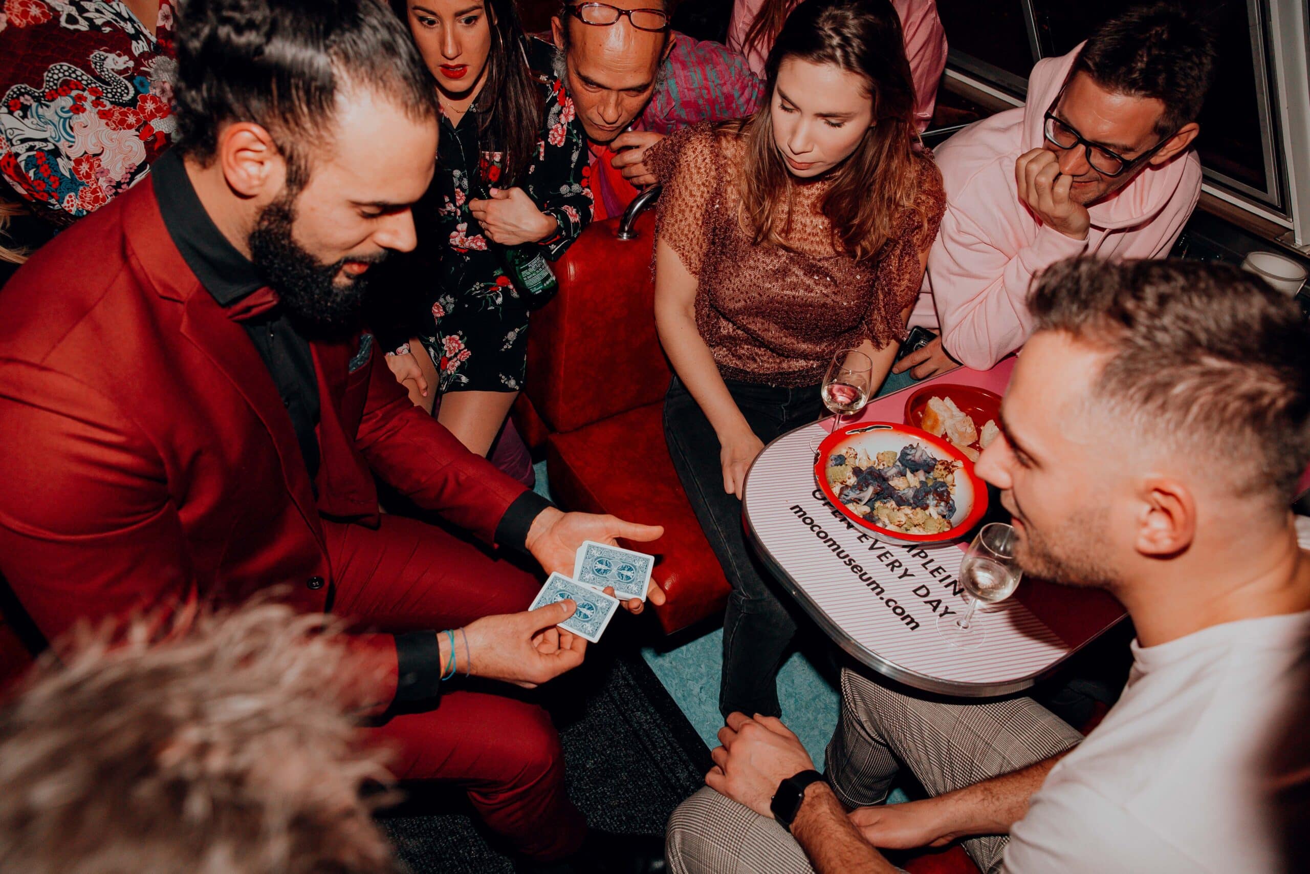 Guests amazed by Kariem’s magic at a private party